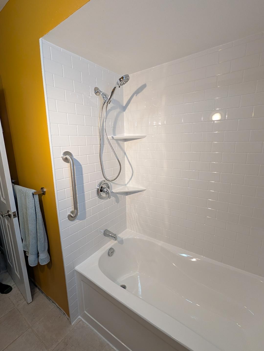 Acrylic wall panels installed in a tub surround